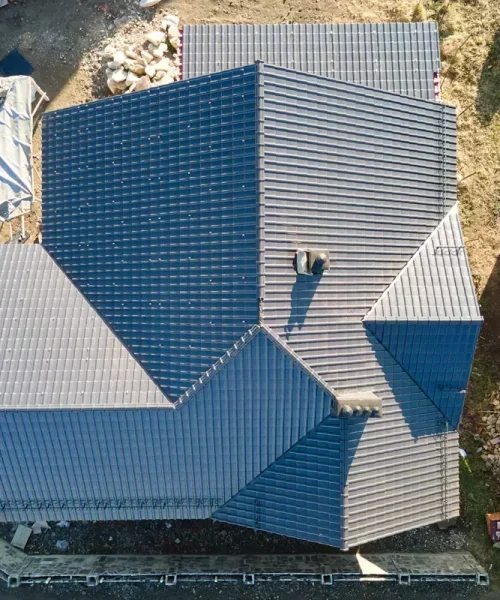 chimney-on-house-roof-top-covered-with-metallic-sh-2024-12-06-16-39-08-utc-scaled-1-r52oosyud1221pnosszf9yx4edlmq9w9nu55v5w700